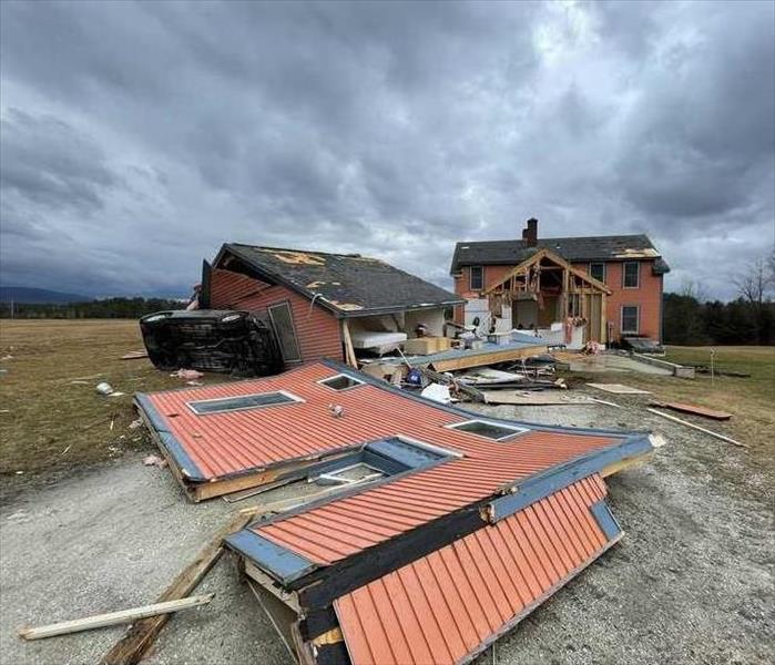 Storm Damage demolished House and Garage. 